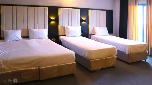 Four-bed room at Aramis Hotel Kish