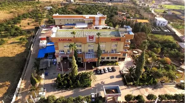 Peaceful exterior view of Badeleh Hotel Sari