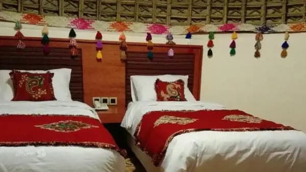 تصویر اتاق دو تخته تویین هتل پارسیان قلعه گنج اتاق دو تخته تویین در هتل پارسیان قلعه گنج