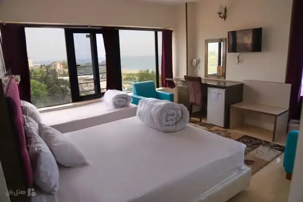 تصویر اتاق سه تخته تراس دار هتل لیدو رامسر اتاق سه تخته با تراس در هتل لیدو رامسر