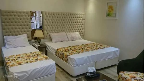 تصویر اتاق سه تخته هتل عمارت مشهد اتاق سه تخته با فضای بزرگ در هتل عمارت مشهد